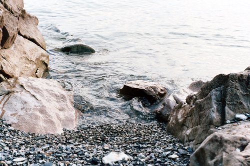 A photo of waves washing ashore. Lone Rock Point, BTV